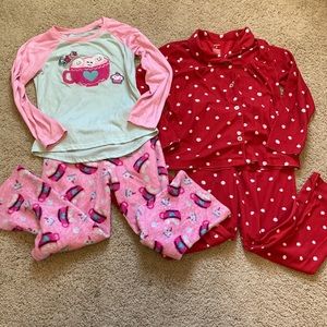 Size 8 fall/winter pajamas. Red-carters like new condition pink gently used